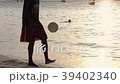 Silhouettes young friends playing beach football 39402340
