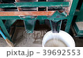 Rice mills are working. 39692553