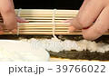 Cook curls sushi roll with stuffing 39766022
