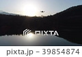 Multicopter over the water at sunset 39854874