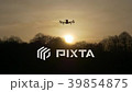 Dron at sunset in the rays of the setting sun 39854875
