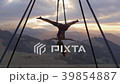 Beautiful girl practicing fly-yoga poses 39854887
