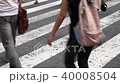 People walking in Tokyo Shibuya scramble intersection 40008504