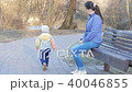 Mother and baby are playing merrily tease during the sunny mild of the sunset. In the outdoors of 40046855