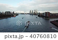 4k Aerial shot of ships in Rotterdam canal 40760810