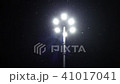 Street lamp illuminates the snow 41017041