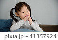 Little asian girl eating jelly dessert  41357924