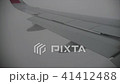 passenger aircraft airplane wing under hard rain  41412488