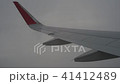 passenger aircraft airplane wing under hard rain  41412489