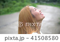 Smiling Young Woman Enjoying Nature. 41508580