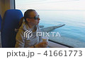 Sweet, Lonely Girl Goes to Work in an Empty Train in the Early Morning 41661773