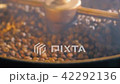 Coffee roaster beans closeup slowmotion 42292136