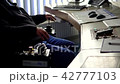 Industrial worker in control room 42777103