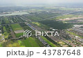 Aerial view of city through airplane window 43787648