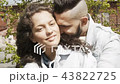 Kissing young couple in bright sunlight 43822725