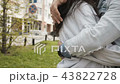 Crop embracing anonymous couple on street 43822728