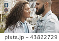 Kissing young couple with eyes closed 43822729