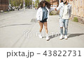 Woman in quarrel with man on street 43822731