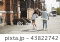 Happy couple dancing on city street 43822742