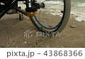 A wheelchair sits next to the sea 43868366