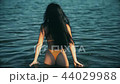 Young brunette woman going to swim. 44029988