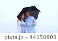 Couple umbrella hand in hand Couple umbrella hand in hand 44150803