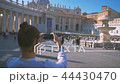 girl does a photo on the central square of the Vatican Piazza San Pietro 44430470