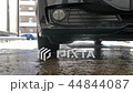 Blue sedan car washing in the sink 44844087