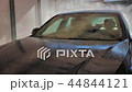 Blue sedan car washing in the sink 44844121