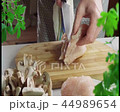 Slicing chicken breast on cutting board 44989654