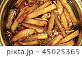 Homemade french fries are deep fried. Slow motion 45025365