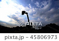 silhouette of digger with sun in construction site 45806973