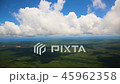 View of the earth and clouds from the window of the airplane. 45962358
