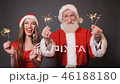 Santa and Helper Dance with Fireworks 46188180