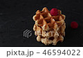 Belgian waffles with raspberries and sugar powder 46594022