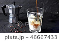 Pouring in glass with ice cream ice coffee 46667433