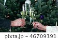 Couple toasting glasses with white champagne wine 46709391