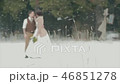 blurred loving couple standing in snowy winter park 46851278