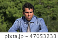 Serious Hispanic Man 47053233