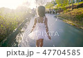Rear view of a beautiful little girl in a fairy costume 47704585