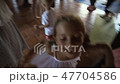 Little happy girl with long hair and a white dress 47704586