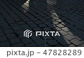 Pedestrians walk/cross big city intersection 47828289