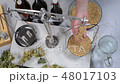 Home brewing of beer. Man weighs barley.  View fro 48017103
