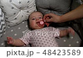 Newborn baby. Little baby. Child. Adorable baby girl. Baby in crib. Baby in bed 48423589