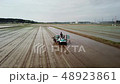 Male drone picture which starts planting rice with rice transplanter 48923861
