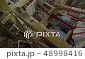 Weaver who is weaving traditional belt. 48998416