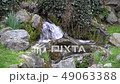 Flowing water stream, water drops and reflection 49063388