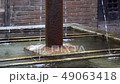 Old steel rusty fountain, flowing water. 49063418