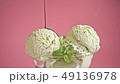 scoops of pistachio ice cream chocolate glaze 49136978