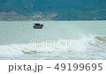 boat on the sea in the waves 49199695